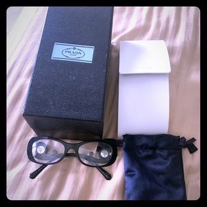 Prada frames with 2 cases and the original box.